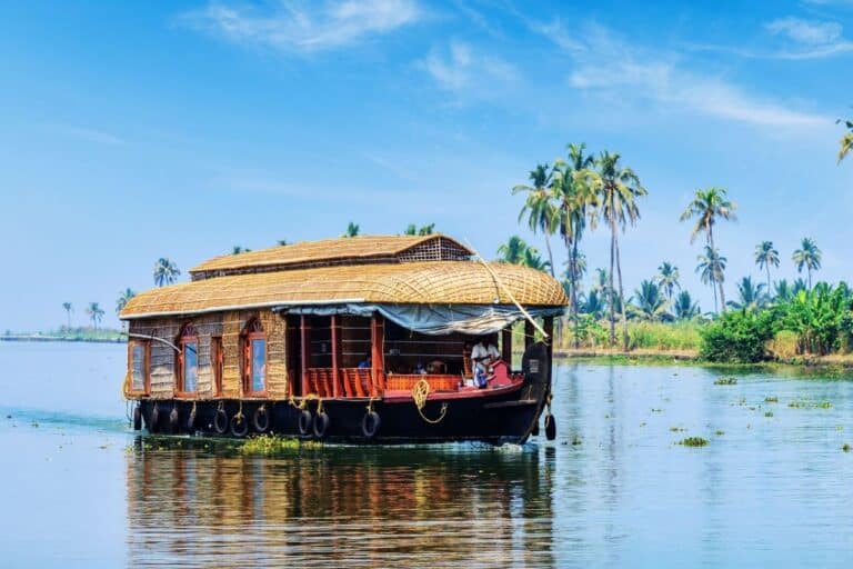 luxury-houseboat-kerala-backwaters with backwaters, tea hills and coastal stays