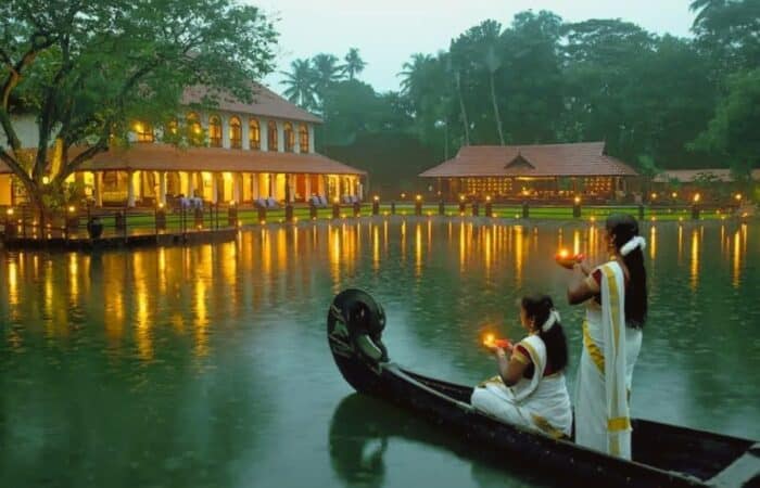 Alleppey houseboat with serene backwaters, traditional boat interiors and sunset reflections in a tailor-made Kerala escape